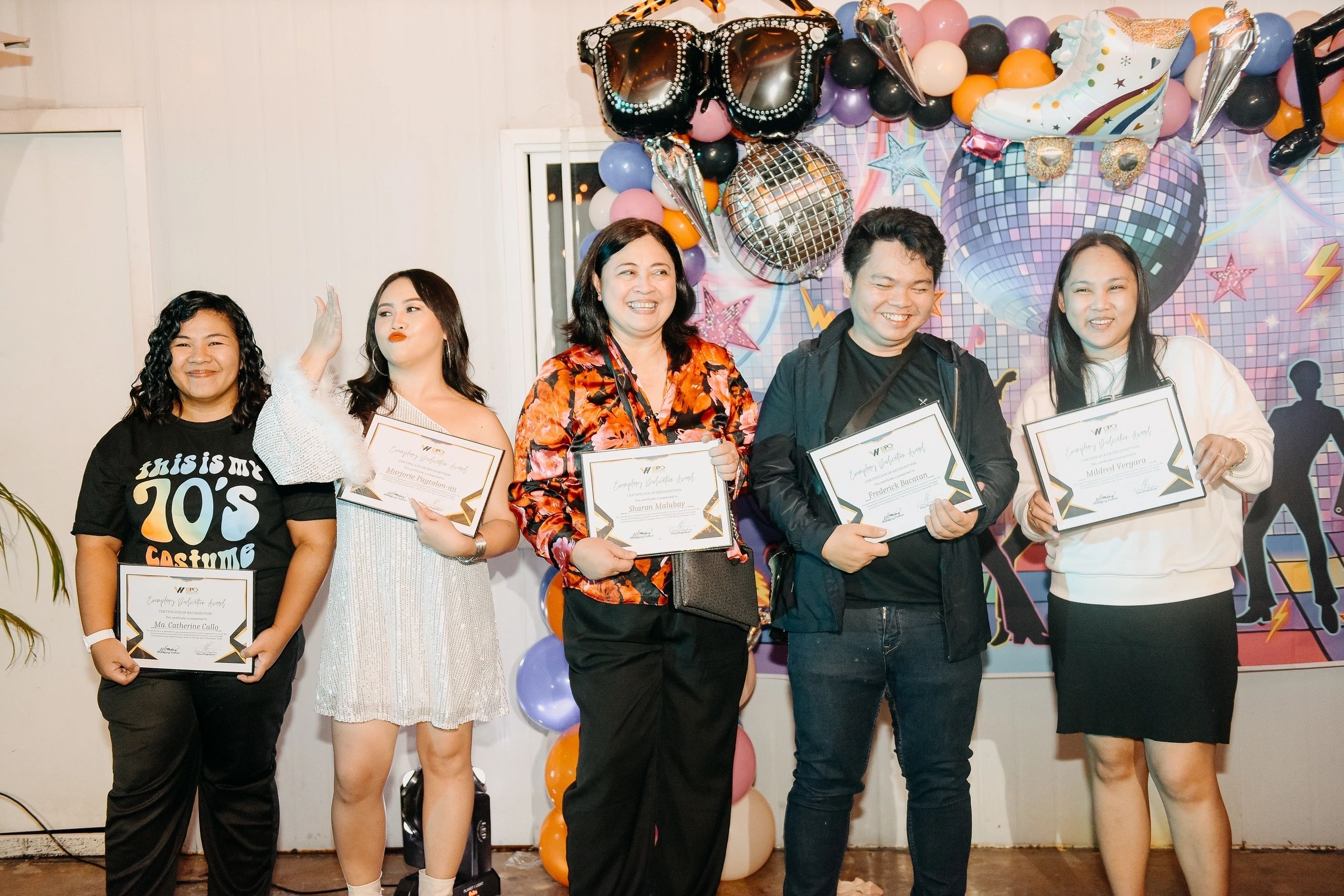 VH BPO Services team members receiving employee recognition awards